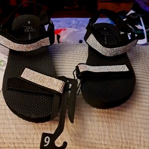 Black studded sandals. Never worn.